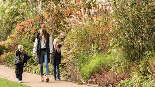 Visitors in the garden at Halloween at Hardwick Hall, Derbyshire